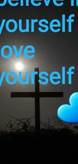 Silhouette of a cross with inspirational text: believe in yourself, love yourself.