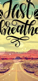 Inspirational 'Just Breathe' desert road wallpaper.