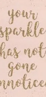 Inspirational glitter quote on a pink background.