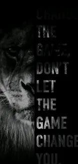 Lion with motivational quote wallpaper in black, perfect for inspiration.