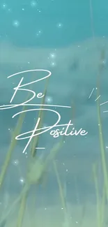 Be Positive text over a beautiful nature background with blue sky.