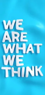 Bright blue background with inspirational quote in white letters.