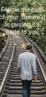 Inspirational scene with person walking on a railroad path.