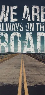 Motivational 'We Are Always On The Road' wallpaper with rustic road image.