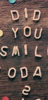 Wooden background with 'Did You Smile Today?' surrounded by colorful dots.