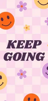 Bright pink wallpaper with smiley faces and motivational text 'Keep Going'.