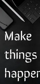 Black wallpaper with 'Make things happen' text and tech accessories.