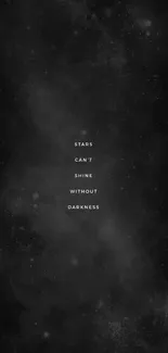 Black wallpaper with inspirational quote about stars and darkness.