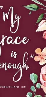 Floral wallpaper with 'My grace is enough' quote on burgundy background.