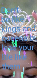 Person holding a crown with empowering text, set against a green background.