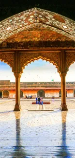 Intricate archway with vibrant courtyard view.