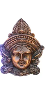 Intricate bronze sculpture on white background.