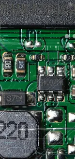 Intricate green circuit board wallpaper for mobile display.