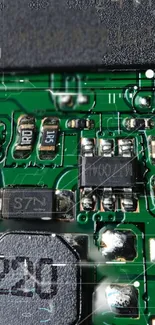 Close-up of a circuit board with green and silver components.