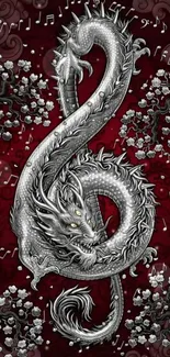 Intricate silver dragon on deep red background with musical notes and floral accents.