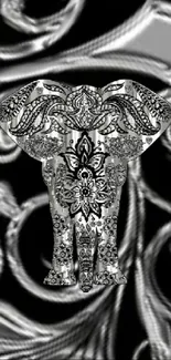 Intricate black and grey elephant wallpaper with detailed patterns.