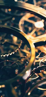 Close-up of golden gears and intricate clockwork design wallpaper.