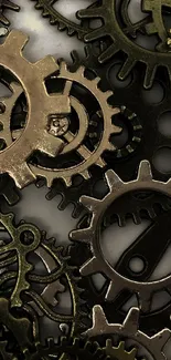 Intricate gears and cogs in metallic tones for mobile wallpaper.