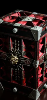 Intricate Gothic box with red and black details on a dark background.