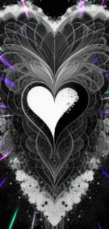 Intricate heart design in monochrome on black background wallpaper.