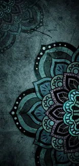 Intricate teal mandala art on dark background wallpaper.