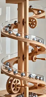 Wooden marble machine with gears and balls.