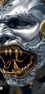 Detailed metallic beast mask with gold accents on a mobile wallpaper.