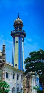 Intricate mosque with blue sky background mobile wallpaper.