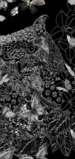 Intricate owl and butterfly floral wallpaper in black and white.