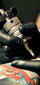 Close-up of a tattoo needle on colorful skin, highlighting intricate tattoo art.