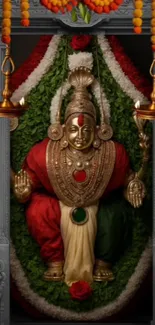 Intricate deity art with ornate decorations centered in vibrant colors.