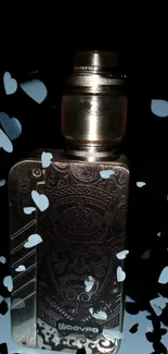 Intricate vape mod with heart accents on a black background.