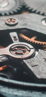 Closeup of intricate watch gears and mechanical details in dark gray tones.