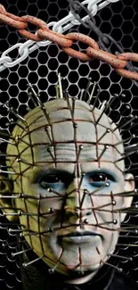 Face with chains and hexagonal backdrop wallpaper.