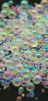 Iridescent bubbles on a black background, perfect for a vibrant phone wallpaper.