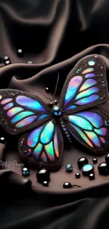 Iridescent butterfly on black silky fabric, vibrant colors.