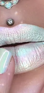 Close-up of iridescent lips with stylish nail art for a chic wallpaper aesthetic.