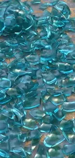 Iridescent shattered glass pieces with a blue hue.