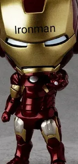 Iron Man action figure with red and gold armor for mobile wallpaper.