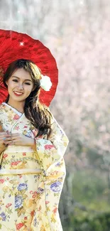 Woman in kimono with red umbrella in a flowering Japanese garden.