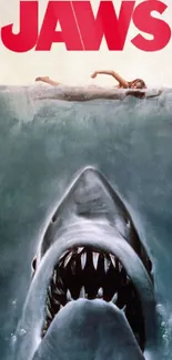 Jaws wallpaper with a shark approaching swimmer from underwater.