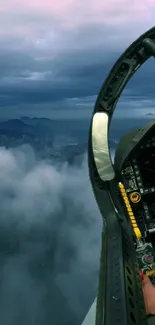 Jet cockpit soaring through cloudy skies with mountainous horizon.