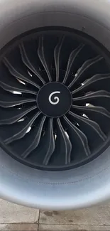 Close-up of a jet engine showcasing intricate turbine design.