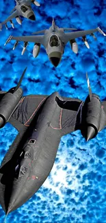 Jet fighters soaring through a vivid blue sky.