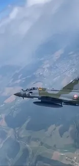 Military jet flying high above a scenic landscape.