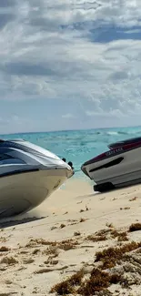 Jet skis on a sandy beach by turquoise water.