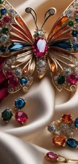 Butterfly adorned with jewels on silk fabric background.