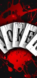 Bold Joker cards with red splashes on black background.