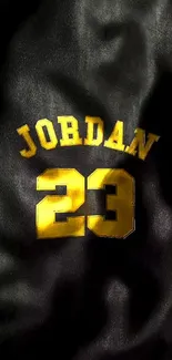 Black wallpaper with gold 'Jordan 23' lettering.