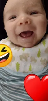 Smiling baby with laugh and heart emojis in a playful mobile wallpaper.